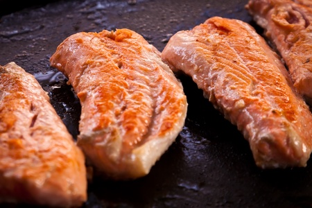 Raw Salmon Fillets on the grill