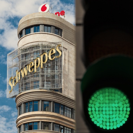 MADRID, SPAIN - AUGUST 12: Capitol Building, designed by architects Luis Martinez-Feduchi and Vicente Eced y Eced and built between 1931 and 1933, is one of the best known of the Gran Via street. Has been considered as an icon of the street in the centenaの写真素材