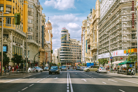 MADRID, SPAIN - SEPTEMBER 7: View Gran Via with the Capitol Building, one of the main streets and most famous landmarks of the city, on September 7, 2014 in Madrid, Spainのeditorial素材