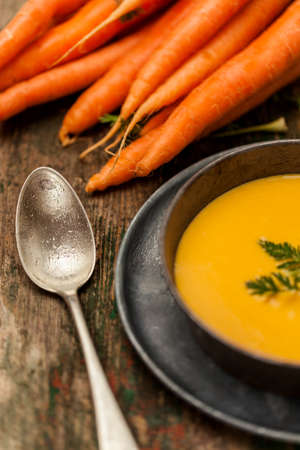 Carrot Cream over a Wood Backgroundの写真素材