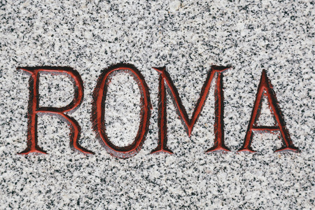 Roma Word Carved in Marble Stoneの写真素材