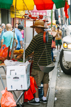 NEW YORK CITY - JUNE 16: Chinatown with an estimated population of 100,000 people is a neighborhood in Manhattan that is home to the largest enclave of Chinese people in the Western Hemisphere, on June 16, 2015 in Manhattan, New Yorkのeditorial素材