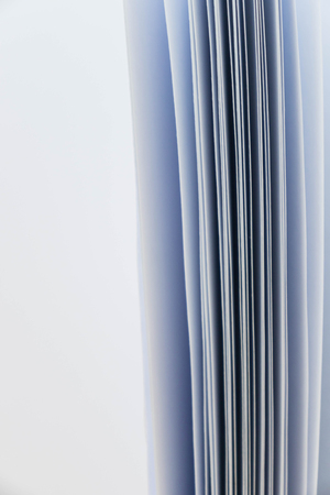 The vertical line of white paper is the background.の写真素材