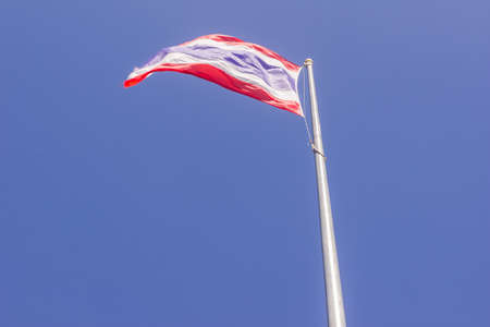 Thailand flag against blue sky background