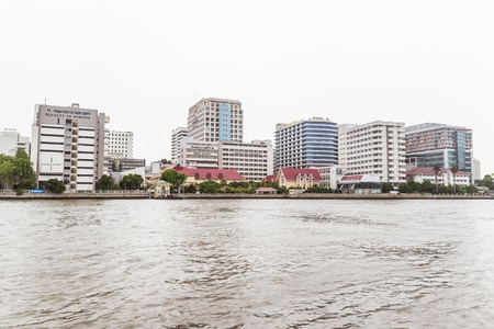 Bangkok, Thailand - June 5, 2016: Siriraj Hospital view from the other side of Chao Phraya River on cloudy day. It is the oldest and the most famous hospital in Thailand and part of Mahidol universityのeditorial素材