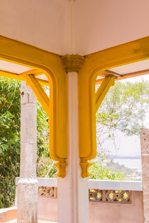 Phuket, Thailand - April 25, 2016 : Old Burmese or Mon style design decoration at column head at Sirey temple, Phuket, Thailand.のeditorial素材
