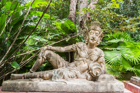 Reclining angel for decoration in botanic gardenの写真素材
