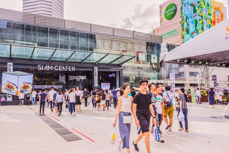 Bangkok, Thailand - July 8, 2017: Crowd of people is walking in front of "Siam Center" the world-class shopping center of Thailand. It is the well-known destination for tourists over the world.のeditorial素材