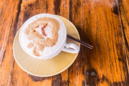 Local and simple fresh coffee on wooden table, street coffee shopの写真素材