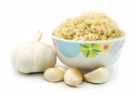 brown rice on whiteの写真素材