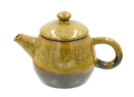 Brown teapot ceramic isolated on white background, with clipping path.の写真素材