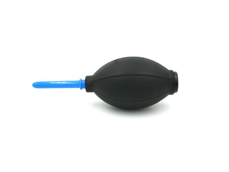 Black silicone blower or Rubber Air Pump Dust Cleaner for camera and lenses isolated on white background.の写真素材