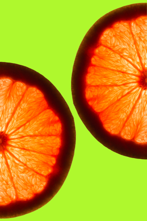 two juicy grapefruit segmentsの写真素材