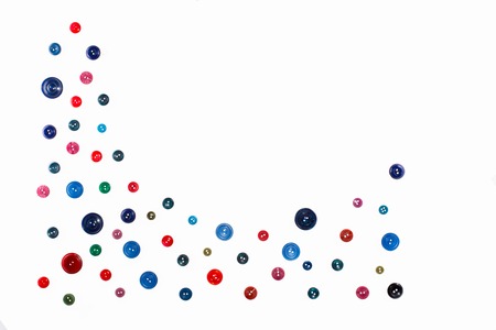 collection of various sewing button on white background