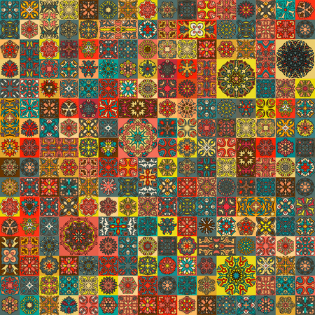 Colorful vintage seamless pattern with floral and mandala elements.のイラスト素材