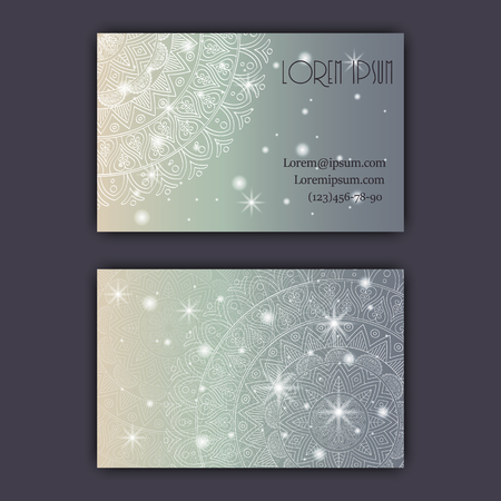 Vector vintage visiting card set. Glowing shiny floral mandala pattern and ornaments. Luxury designのイラスト素材