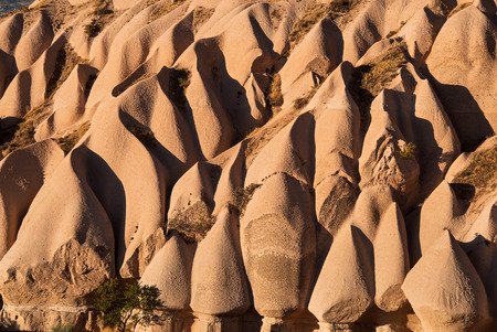 Unusually shaped pink rocks of Cappadociaの写真素材