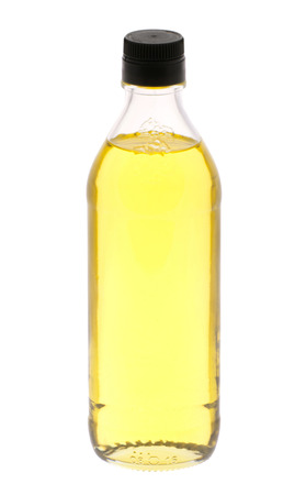 Large bottle of olive oil isolated on whiteの写真素材