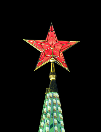 Shining star on Moscow Kremlin tower at night isolated on blackの写真素材