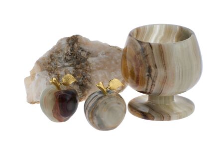Wineglass and two apples made of onyx and unwrought onyx isolated on whiteの写真素材