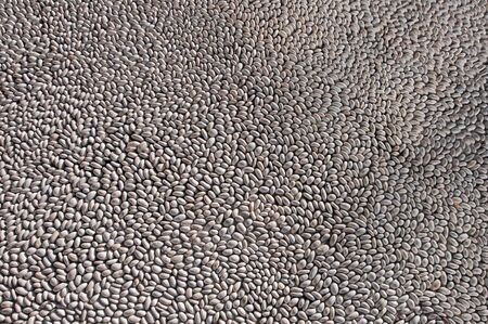 Abstract background from smooth grey sea pebbleの写真素材
