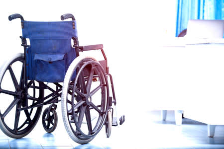 Hospital trolleys waiting for patient service. There is a light copy area on the left area with sun light.の写真素材