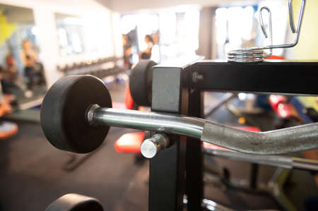 Heavy barbells on the floor of the gym studio copyspace bodybuilding weightlifting fitness power strength endurance agility exercise exerciseの写真素材