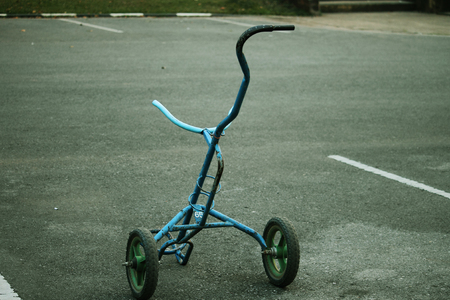 Golf trolley in evening golf course has sunlight shining down at golf course in Thailandの写真素材