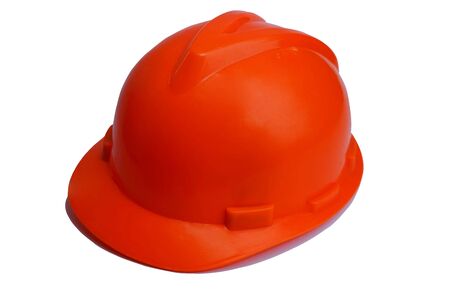 Working hard hat isolated on white background. Orange safety helmet construction on white background.                             の写真素材