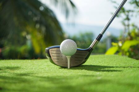  Golf balls on the golf course with golf clubs ready for golf in the first short. In the morning, with the beautiful sunlight.Sports that people around the world play in the holidays.                              の写真素材