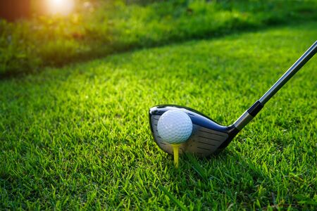 Golf balls on the golf course with golf clubs ready for golf in the first short. In the morning, with the beautiful sunlight.Sports that people around the world play in the holidays. の写真素材
