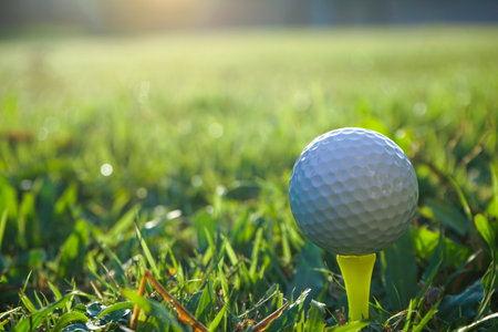 Golf ball on green grass in beautiful golf course in Thailand.の写真素材