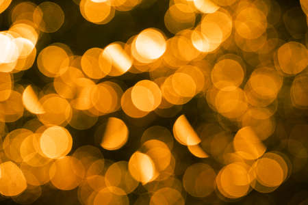 Abstract Golden bokeh abstract background. gold-colored background for Christmas, Easter, companiesの写真素材