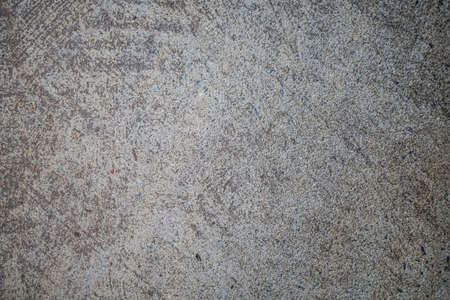 Cement wall background, not painted in vintage style for graphic design or retro wallpaper. Concrete walls with abstract patterns.Old cement texture in vintage style for graphic design or retro wallpaperの写真素材