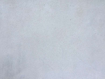 White painted cement wall texture. Abstract grunge gray cement texture background. White concreted wall for interiors or outdoor exposed surface polished concrete.の写真素材