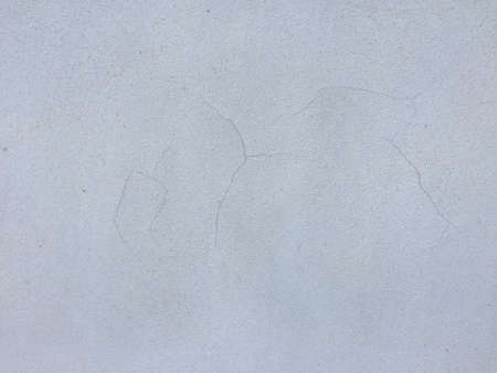 White painted cement wall texture. Abstract grunge gray cement texture background. White concreted wall for interiors or outdoor exposed surface polished concrete.の写真素材