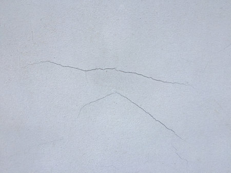 White painted cement wall texture. Abstract grunge gray cement texture background. White concreted wall for interiors or outdoor exposed surface polished concrete.の写真素材