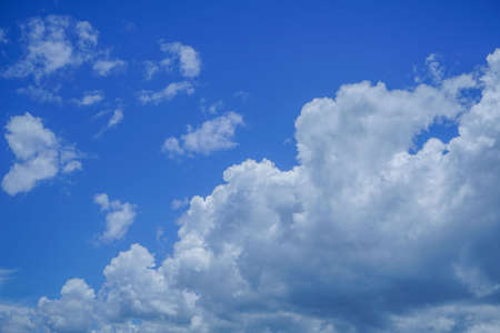 blue sky background with clouds. Beautiful white clouds against the blue sky.の写真素材