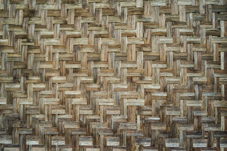 Old bamboo weaving pattern concept background. Texture wood weaving bamboo seamless patterns abstract background.の写真素材