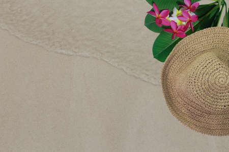 top view sand summer background with copy space. Summer background with copy space with visible sand texture and exotic accessories.の写真素材