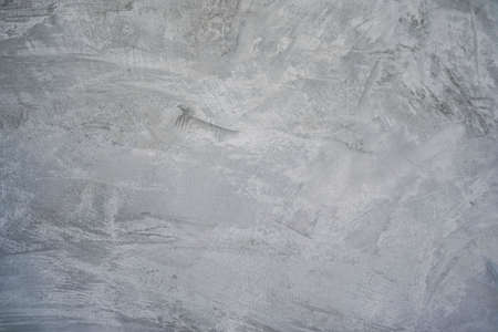 White cement textured wall background. concrete polished material texture background. Texture of old gray concrete wall for background.の写真素材