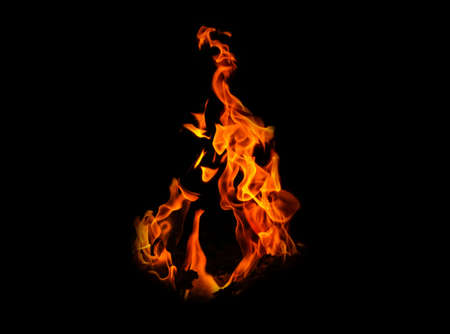Fire flames on black background. abstract fire flame background. The fire in the fire burning naturally waved at night.の写真素材