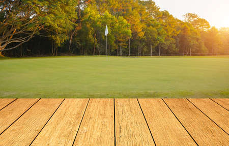Empty wooden table on rice field with rice field background. Wooden table or terrace on rice field and empty display. Space for your montage, For product display.の写真素材