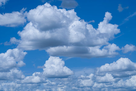 Blue sky with white clouds. Sky and clouds during the daytime in the summer. white fluffy clouds in...