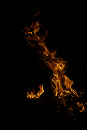 Heat energy heap closely, red and yellow, thermal energy at the fuel point during the night, lights on a black background.の写真素材