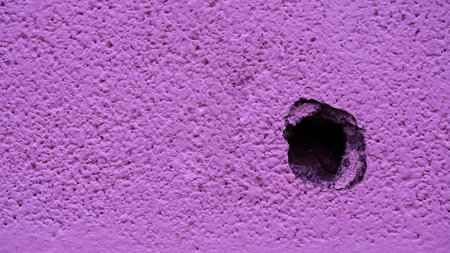 Pink plaster wall , pink background, empty concrete wall, empty space, For use in making a background graphic design.の写真素材