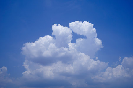 Beautiful blue sky with cloud. Color sky is clear with white clouds on natural background. White fluffy cloudy abstract background.の写真素材
