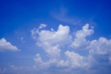 Beautiful blue sky with cloud. Color sky is clear with white clouds on natural background. White fluffy cloudy abstract background.の写真素材