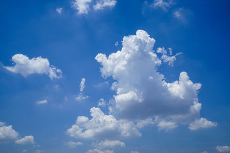 Beautiful blue sky with cloud. Color sky is clear with white clouds on natural background. White fluffy cloudy abstract background.の写真素材