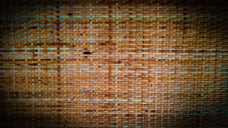 Weave texture natural straw background. Reed weaving mat texture background with vintage style.の写真素材
